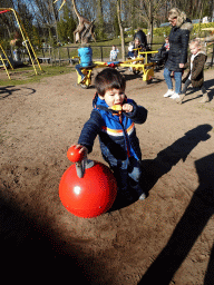 Max with an ice cream at the playground in the Garden of the Oertijdmuseum