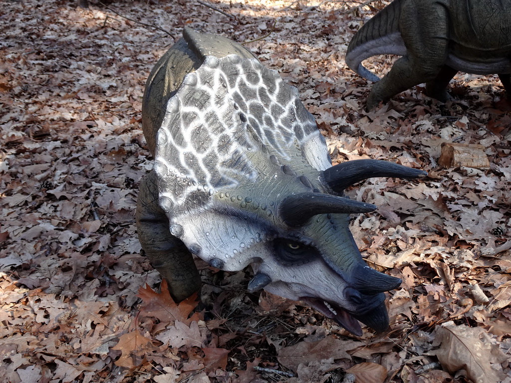 Statue of a young Triceratops in the Oertijdwoud forest of the Oertijdmuseum