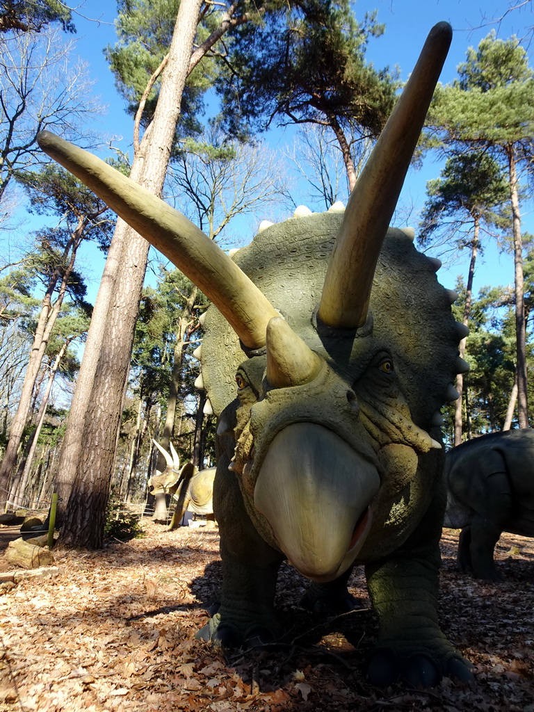 Statue of a Triceratops in the Oertijdwoud forest of the Oertijdmuseum