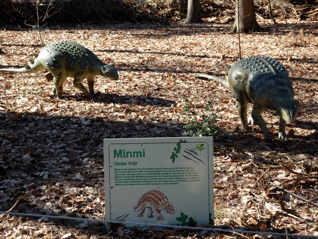 Statues of Minmis in the Oertijdwoud forest of the Oertijdmuseum, with explanation