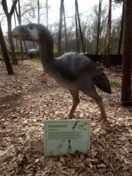 Statue of a Gastornis in the Oertijdwoud forest of the Oertijdmuseum, with explanation