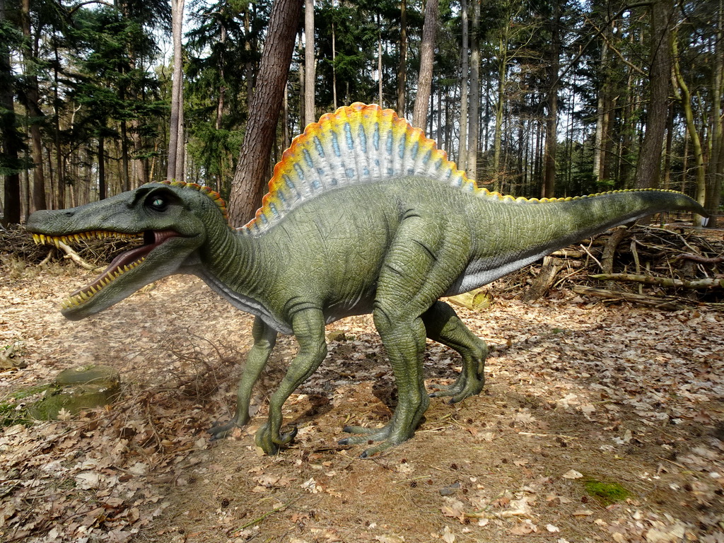 Statue of a Spinosaurus in the Oertijdwoud forest of the Oertijdmuseum