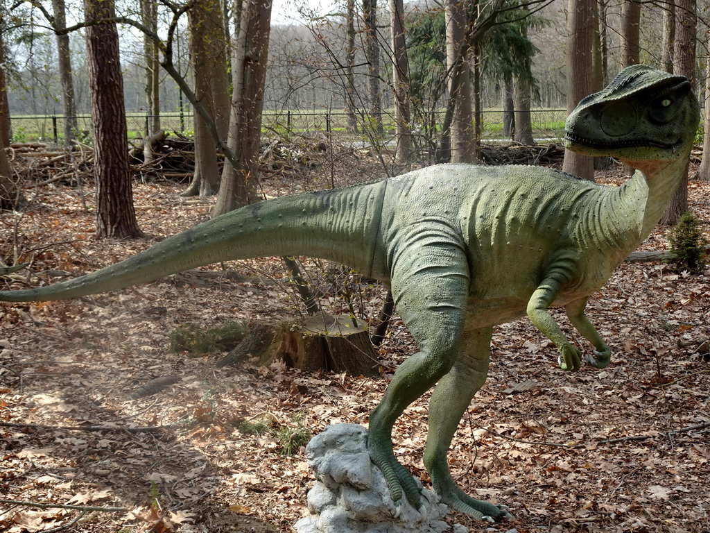 Statue of an Allosaurus at the Oertijdwoud forest of the Oertijdmuseum