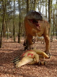 Statues of a Stegosaurus and an Allosaurus at the Oertijdwoud forest of the Oertijdmuseum