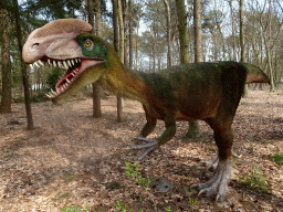 Statue of a Dilophosaurus at the Oertijdwoud forest of the Oertijdmuseum