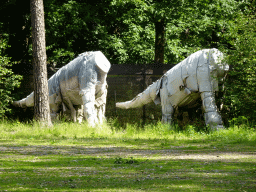 Dinosaur statues at the parking lot of the Oertijdmuseum, under construction