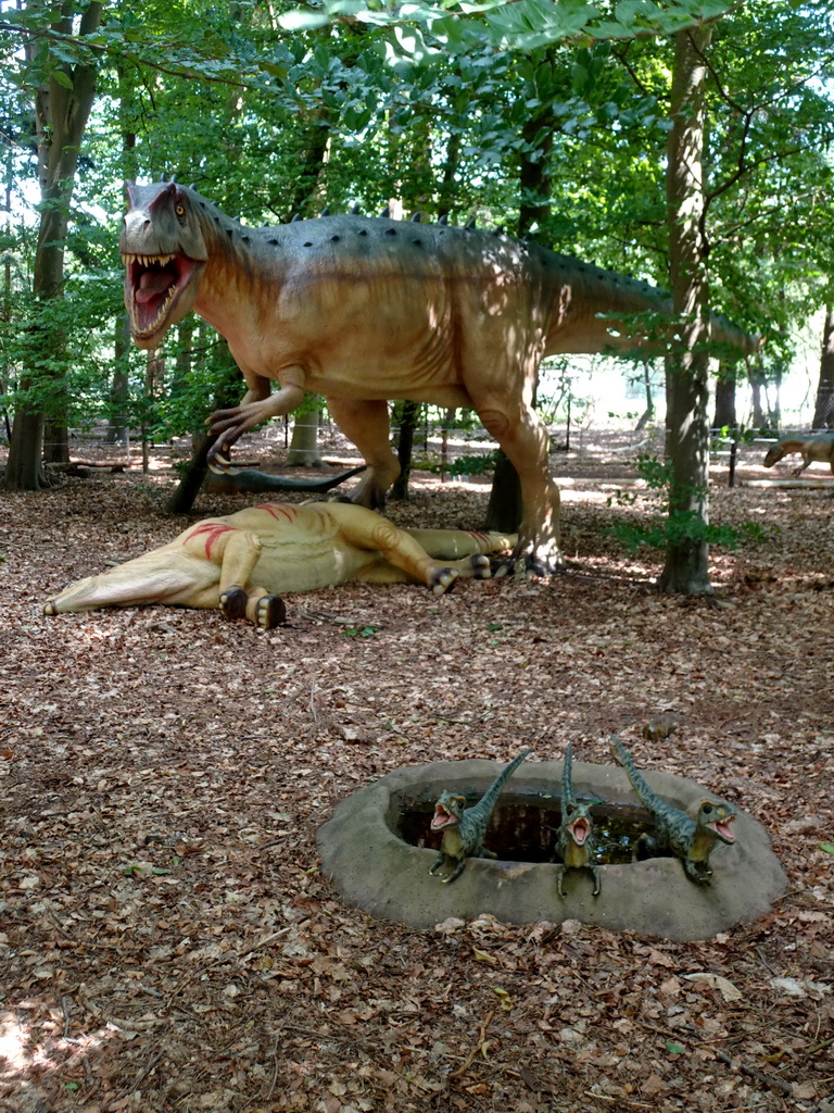 Statues of Tyrannosaurus Rex and another dinosaur in the Oertijdwoud forest of the Oertijdmuseum
