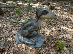 Statue of an Albertonykus in the Oertijdwoud forest of the Oertijdmuseum