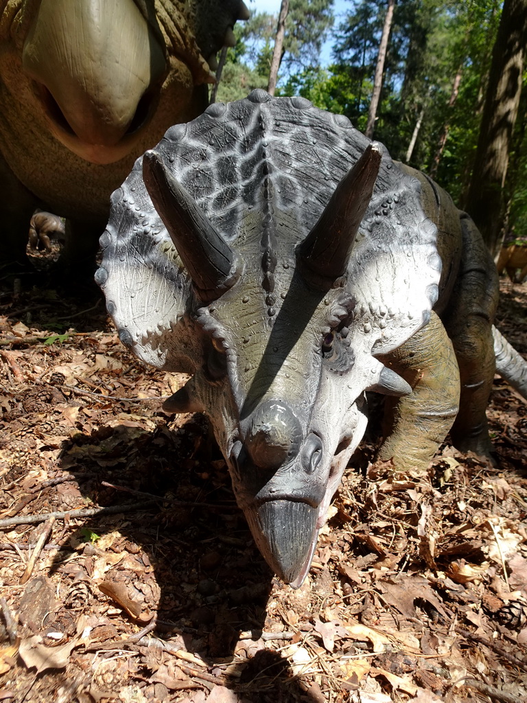 Statue of a Triceratops in the Oertijdwoud forest of the Oertijdmuseum