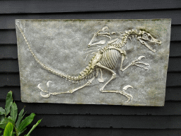 Fossilized dinosaur at the entrance to the Oertijdmuseum at the Bosscheweg street
