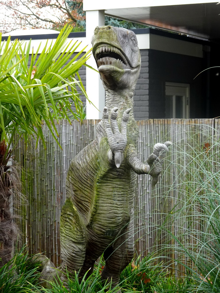 Dinosaur statue in the garden of the Reptielenhuis De Aarde zoo
