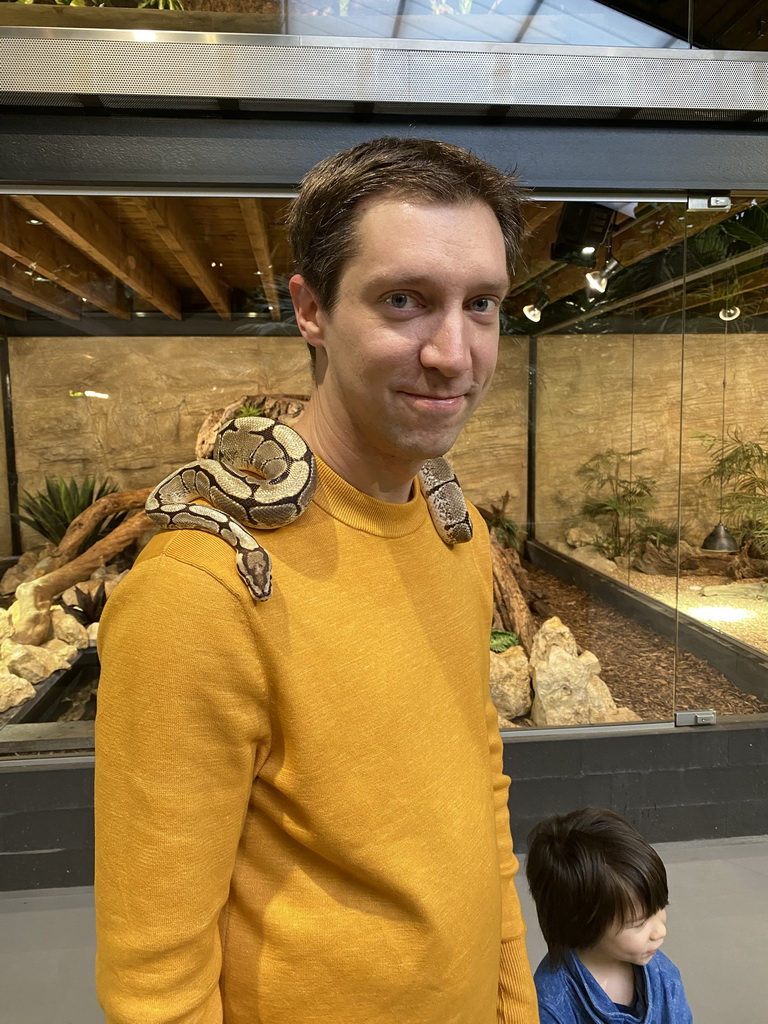 Tim with a Ball Python and Max at the lower floor of the Reptielenhuis De Aarde zoo