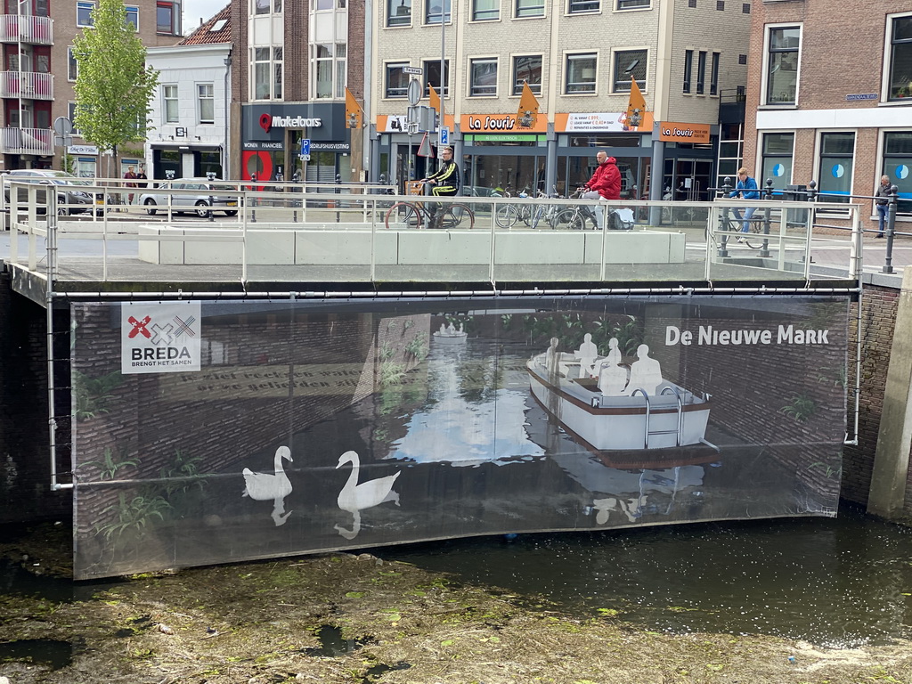 Poster at the Tolbrug bridge at the southwest side of the Haven canal