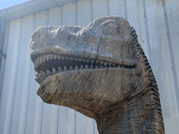 Head of a statue of a Tyrannosaurus Rex at the entrance to the Reptielenhuis De Aarde zoo at the Aardenhoek street