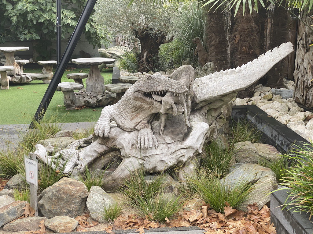 Crocodile statue in the garden of the Reptielenhuis De Aarde zoo