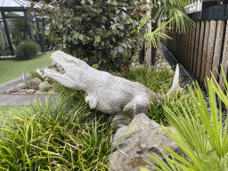 Reptile statue in the garden of the Reptielenhuis De Aarde zoo