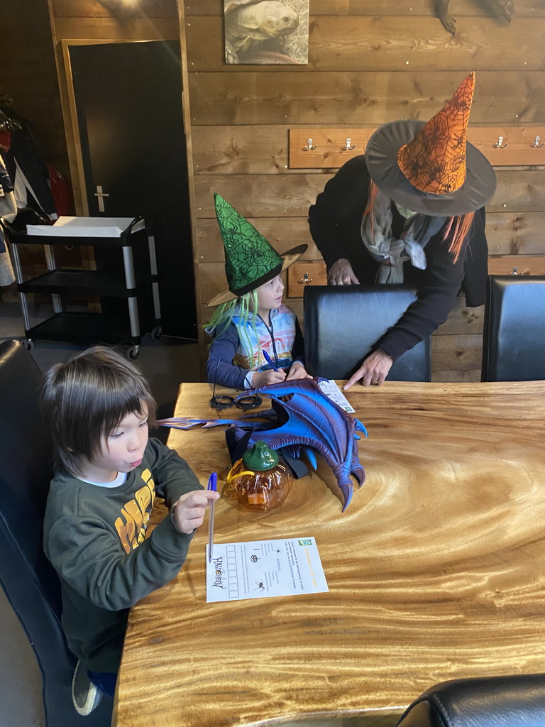 Max and his friend doing the Halloween Quest at the lower floor of the Reptielenhuis De Aarde zoo, during the Halloween 2020 event
