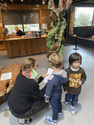 Max and his friend doing scavenger hunt at the lower floor of the Reptielenhuis De Aarde zoo, during the Halloween 2020 event