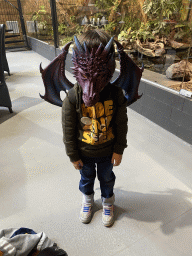 Max with dragon clothes at the lower floor of the Reptielenhuis De Aarde zoo, during the Halloween 2020 event