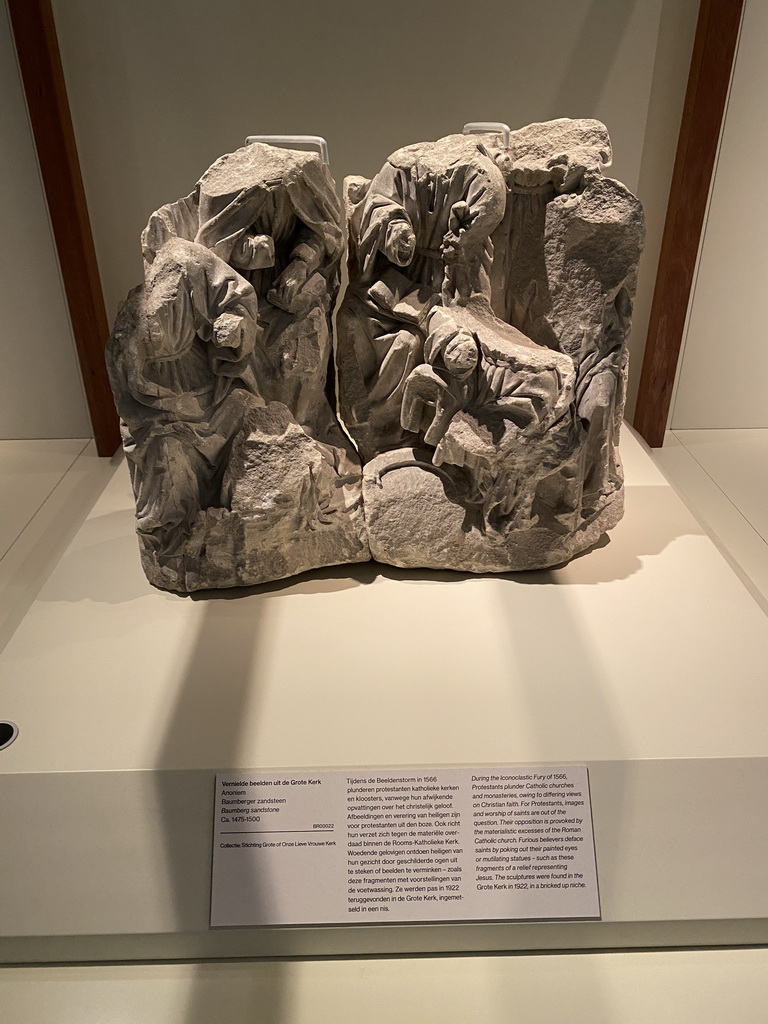 Destroyed sculptures from the Grote Kerk church at the `De Collectie - 450 jaar kunst en geschiedenis` exhibition in Room 1 at the Ground Floor of the Stedelijk Museum Breda, with explanation