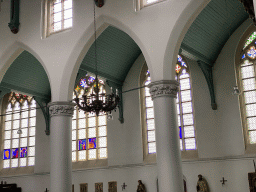 Stained glass windows in the nave of the Sint-Martinuskerk church, viewed from the Maria Chapel