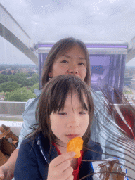 Miaomiao and Max in our capsule at the Smakenrad ferris wheel at the Chasséveld square