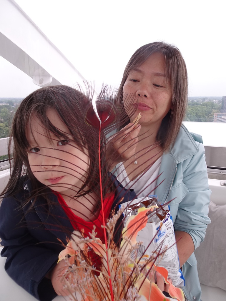 Miaomiao and Max in our capsule at the Smakenrad ferris wheel at the Chasséveld square