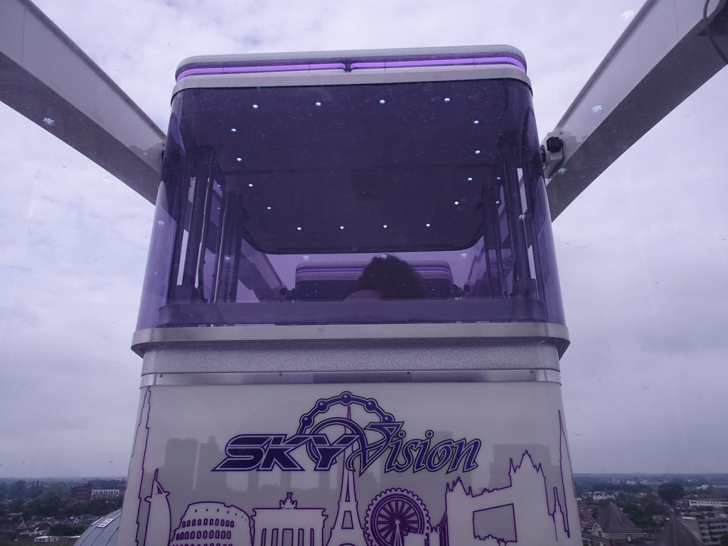 A capsule of the the Smakenrad ferris wheel at the Chasséveld square, viewed from our capsule