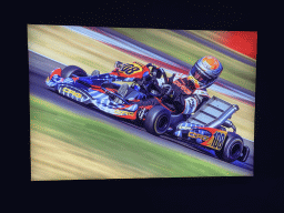Photograph of Max Verstappen in a kart in 2010, at the `Vleugels to the Max` exhibition at the Koepelgevangenis building