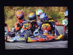 Photograph of Pierre Gasly, Max Verstappen and Alexander Albon in karts in 2010, at the `Vleugels to the Max` exhibition at the Koepelgevangenis building