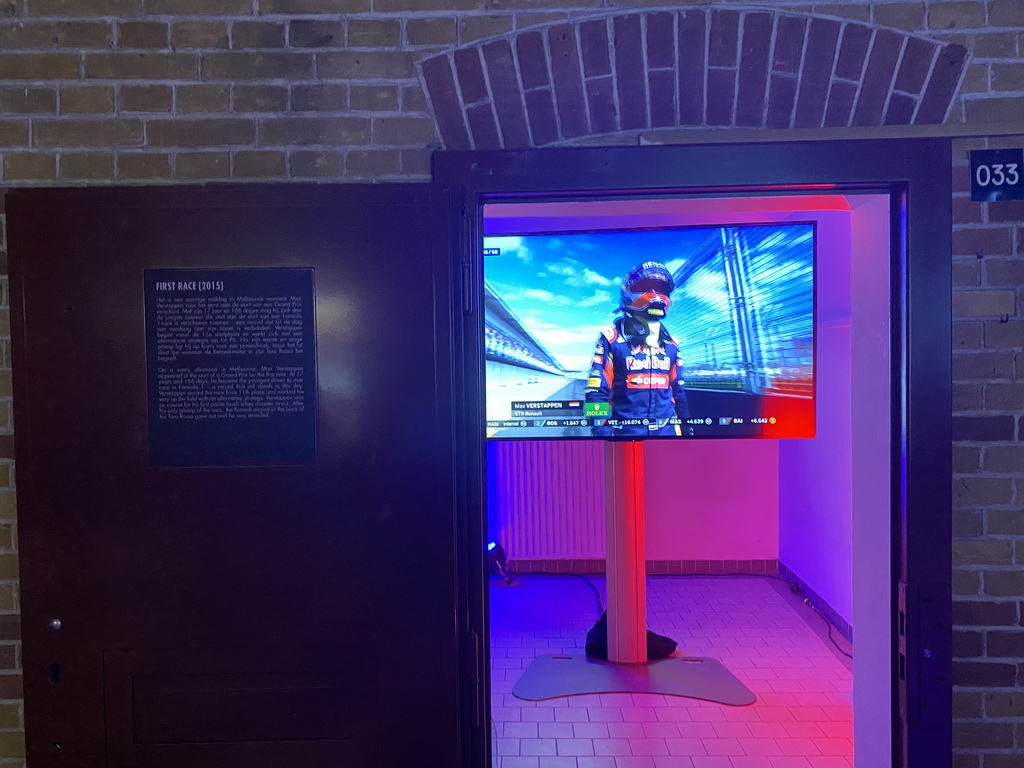 Screen with images of Max Verstappen at his Formula 1 debut at Melbourne in 2015, at the `Vleugels to the Max` exhibition at the Koepelgevangenis building, with explanation