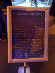 Explanation on the steering wheel of the Red Bull Racing RB14 Formula 1 car at the `Vleugels to the Max` exhibition at the Koepelgevangenis building