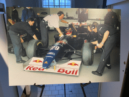 Photograph of David Coulthard in the Red Bull Racing RB1 Formula 1 car in 1995, at the `Vleugels to the Max` exhibition at the Koepelgevangenis building