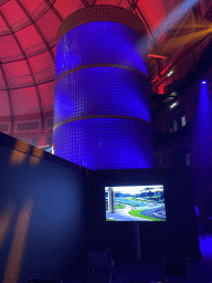 Staircase and a screen with a Formula 1 race, at the `Vleugels to the Max` exhibition at the Koepelgevangenis building