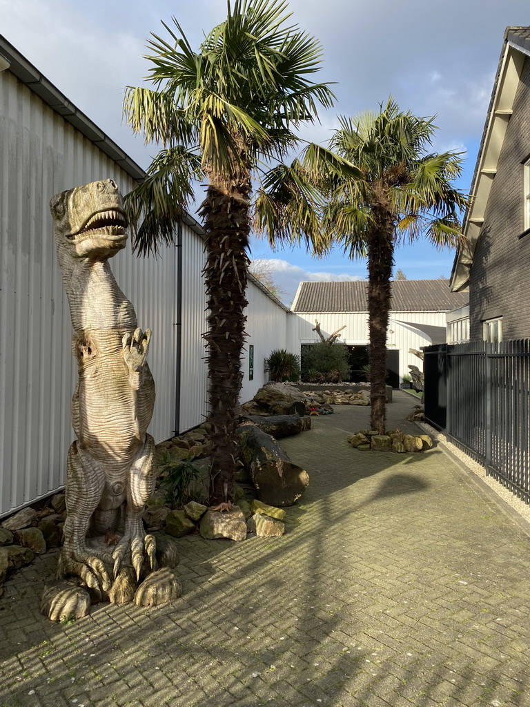 Statue of a Tyrannosaurus Rex at the entrance to the Reptielenhuis De Aarde zoo at the Aardenhoek street