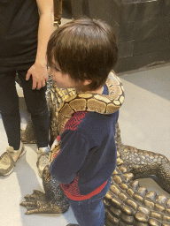 Max with a Ball Python at the lower floor of the Reptielenhuis De Aarde zoo