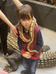 Max with a Ball Python at the lower floor of the Reptielenhuis De Aarde zoo