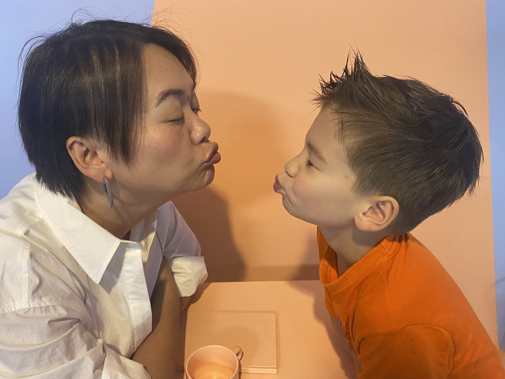 Miaomiao and Max at a coffee table at the SuperNova Experience museum