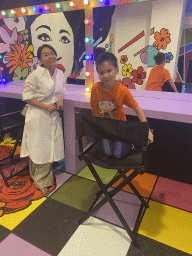 Miaomiao and Max at a make-up table at the make-up room at the SuperNova Experience museum