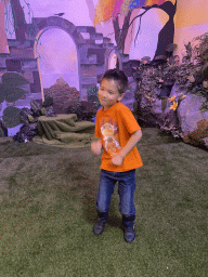 Max at the ruins room at the SuperNova Experience museum