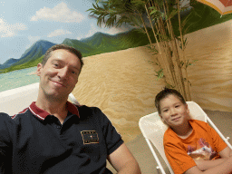 Tim and Max in beach chairs at the SuperNova Experience museum