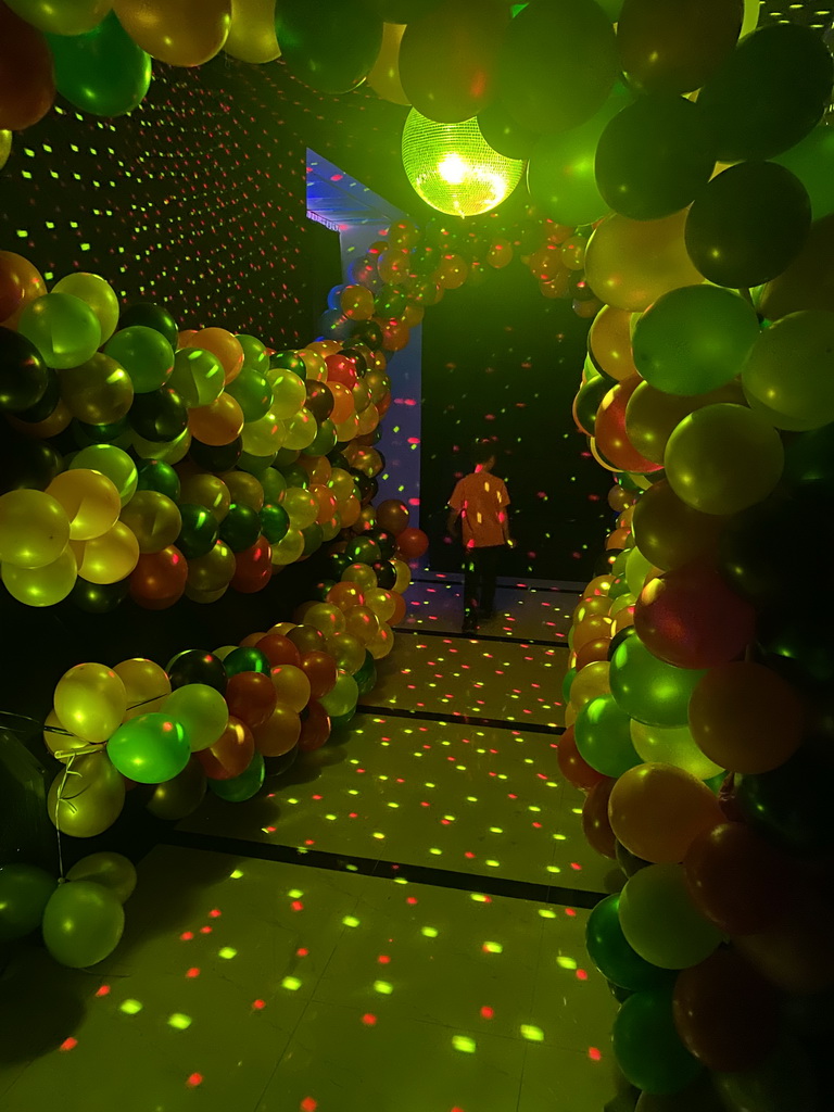 Max at the disco room at the SuperNova Experience museum