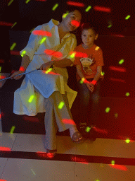 Miaomiao and Max at the disco room at the SuperNova Experience museum