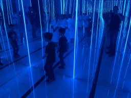 Tim, Miaomiao and Max at the mirror room at the SuperNova Experience museum