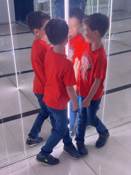 Max at the mirror room at the SuperNova Experience museum