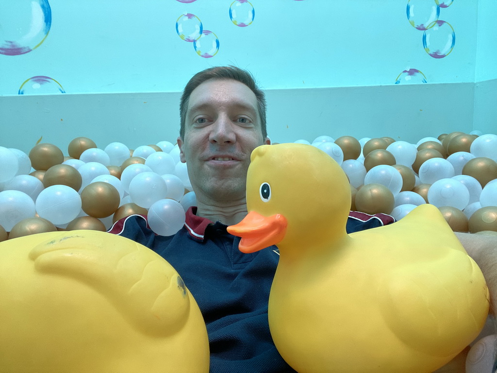 Tim at the ball pit at the SuperNova Experience museum