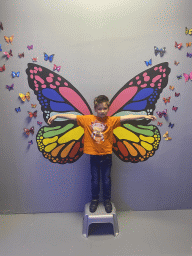 Max with a butterfly at the SuperNova Experience museum