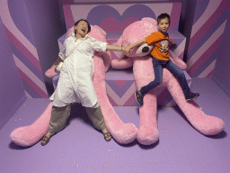 Miaomiao and Max with pink plush bears at the SuperNova Experience museum