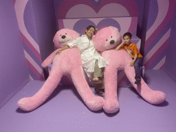 Miaomiao and Max with pink plush bears at the SuperNova Experience museum