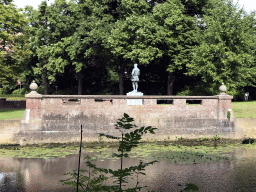 The Mark river and a statue at the east side of the Breda Castle, viewed from the Stadspark Valkenberg